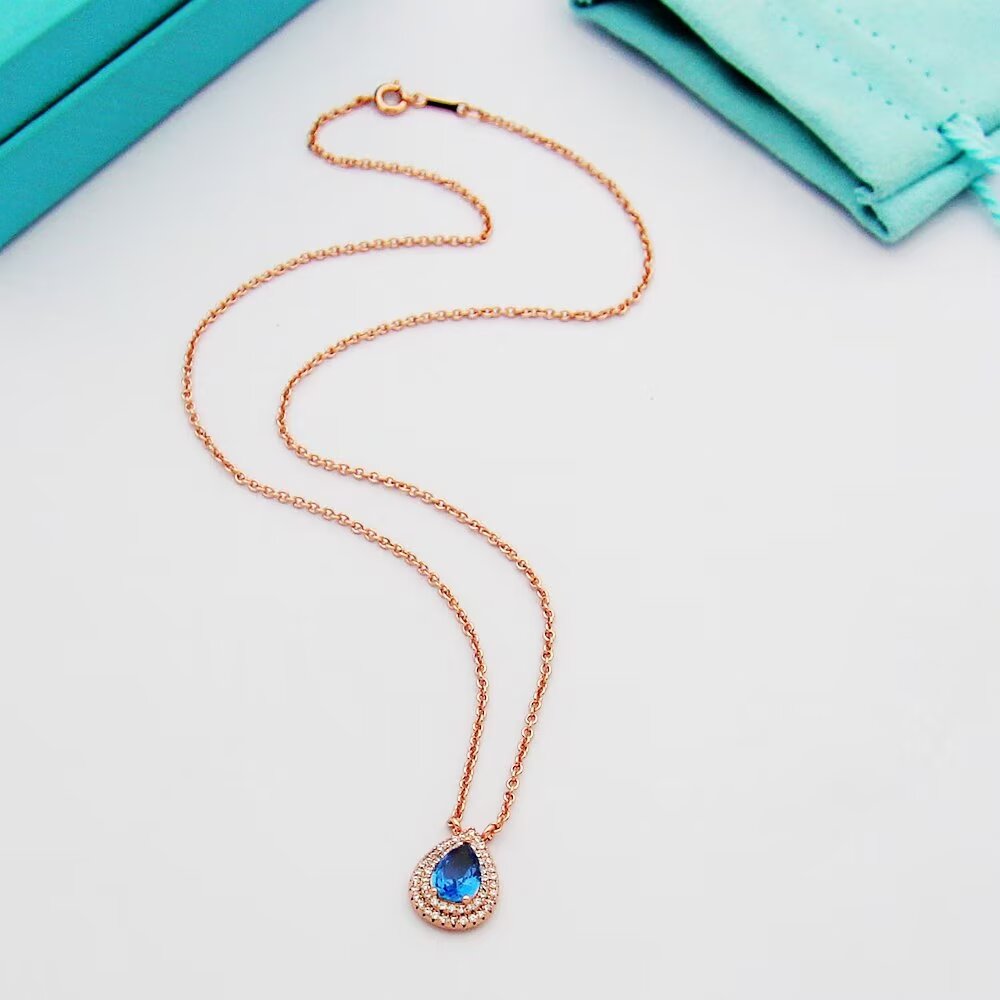 Tiffany & Co. Aquamarine and Diamond Pendant - 