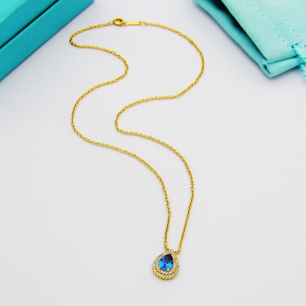 Tiffany & Co. Aquamarine and Diamond Pendant - 