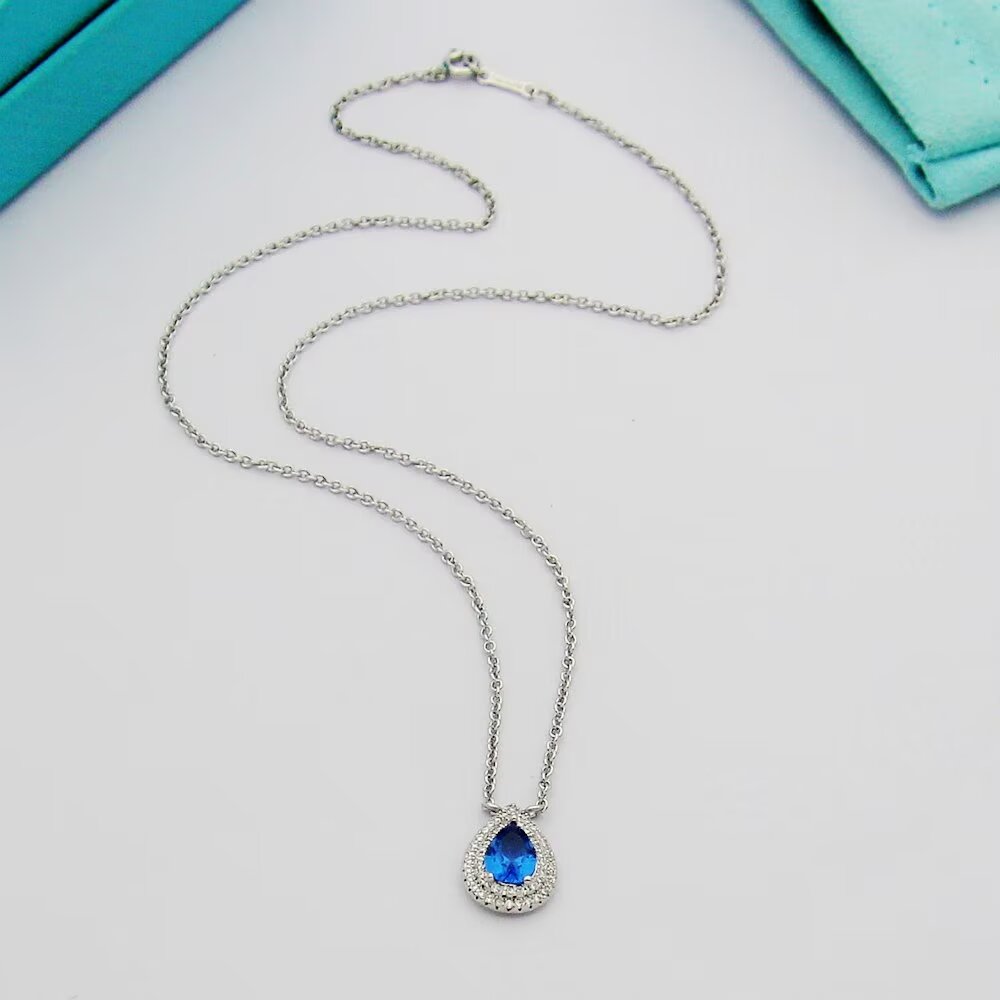 Tiffany & Co. Aquamarine and Diamond Pendant - 
