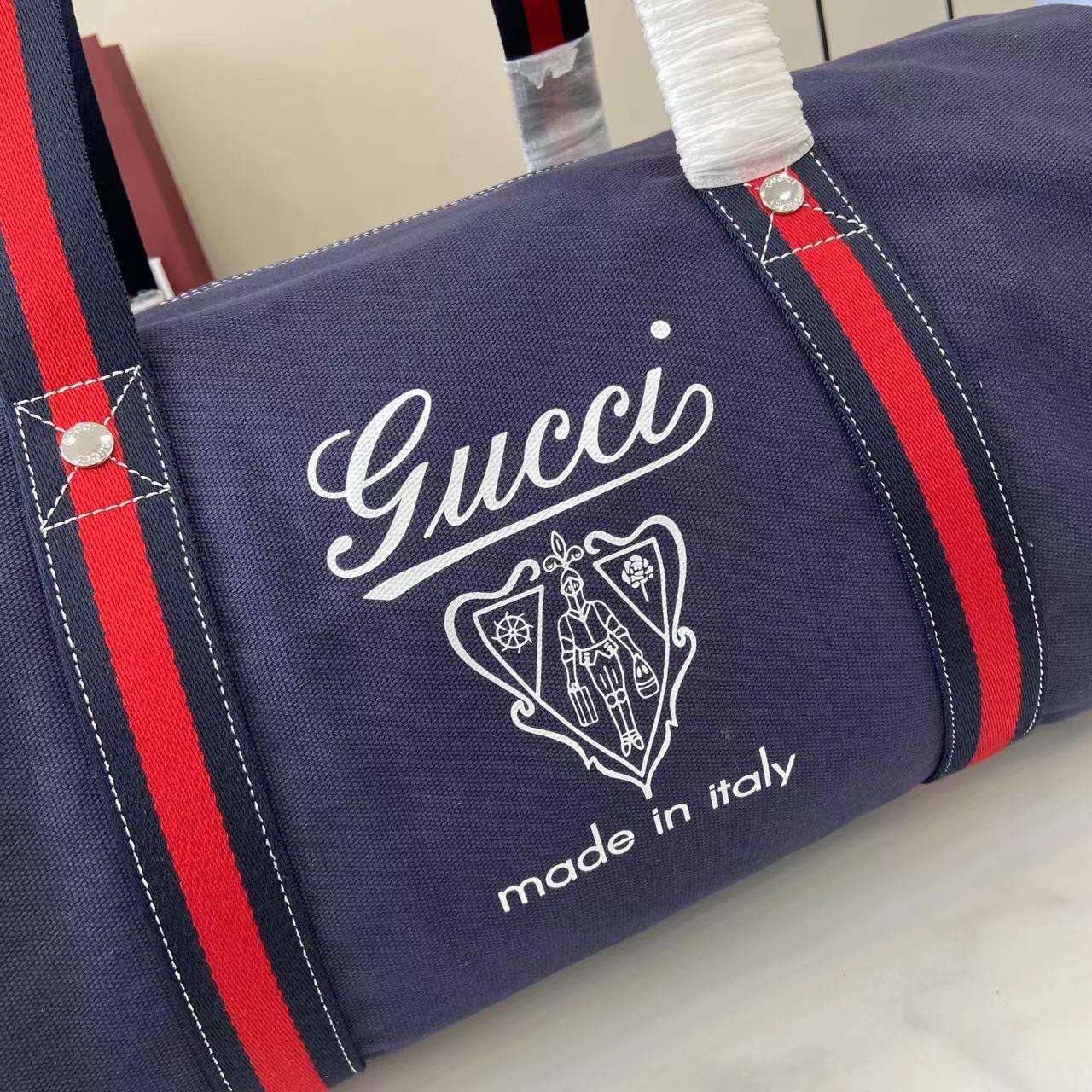 Gucci Large Printed Canvas Duffle Bag - DesignerGu