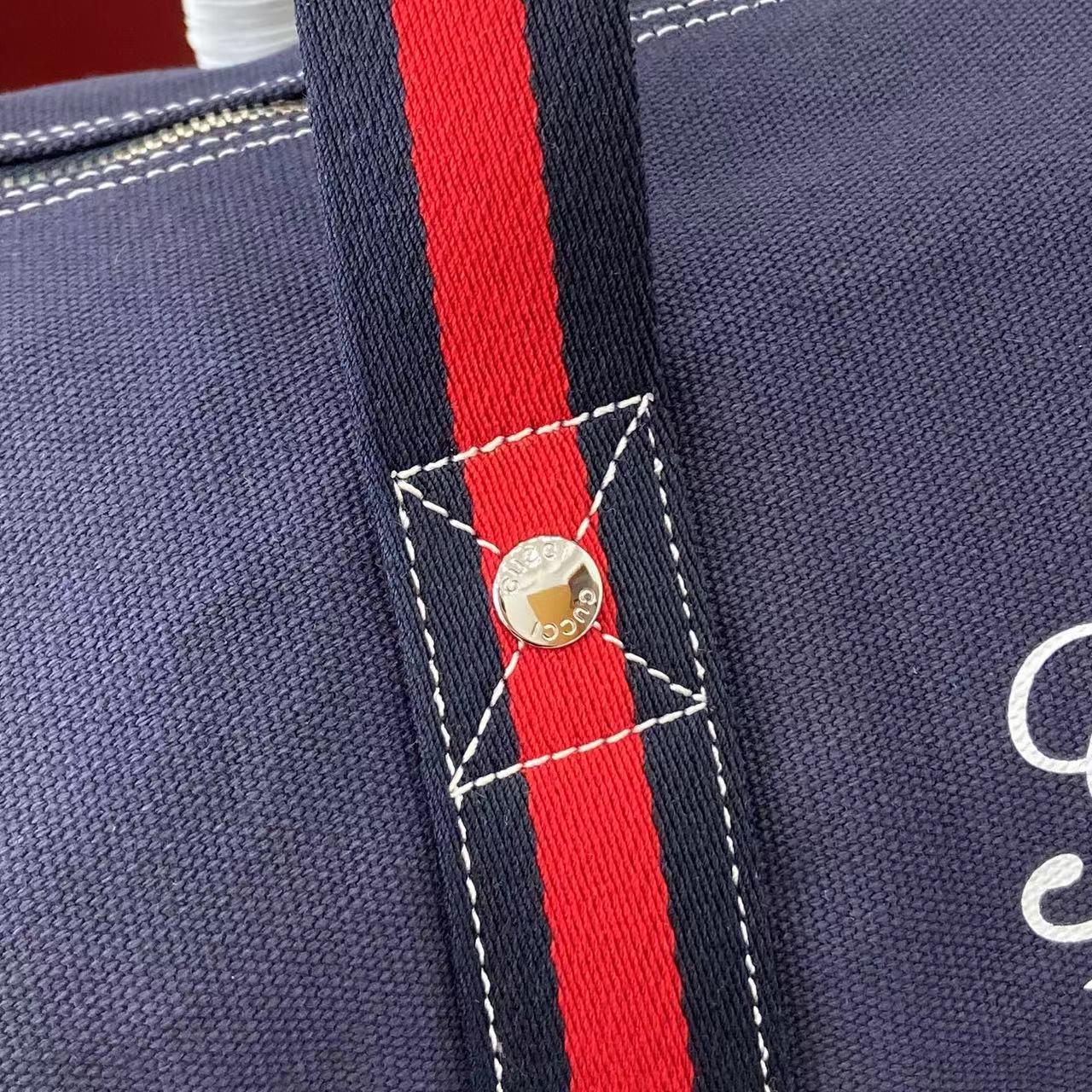 Gucci Large Printed Canvas Duffle Bag - DesignerGu