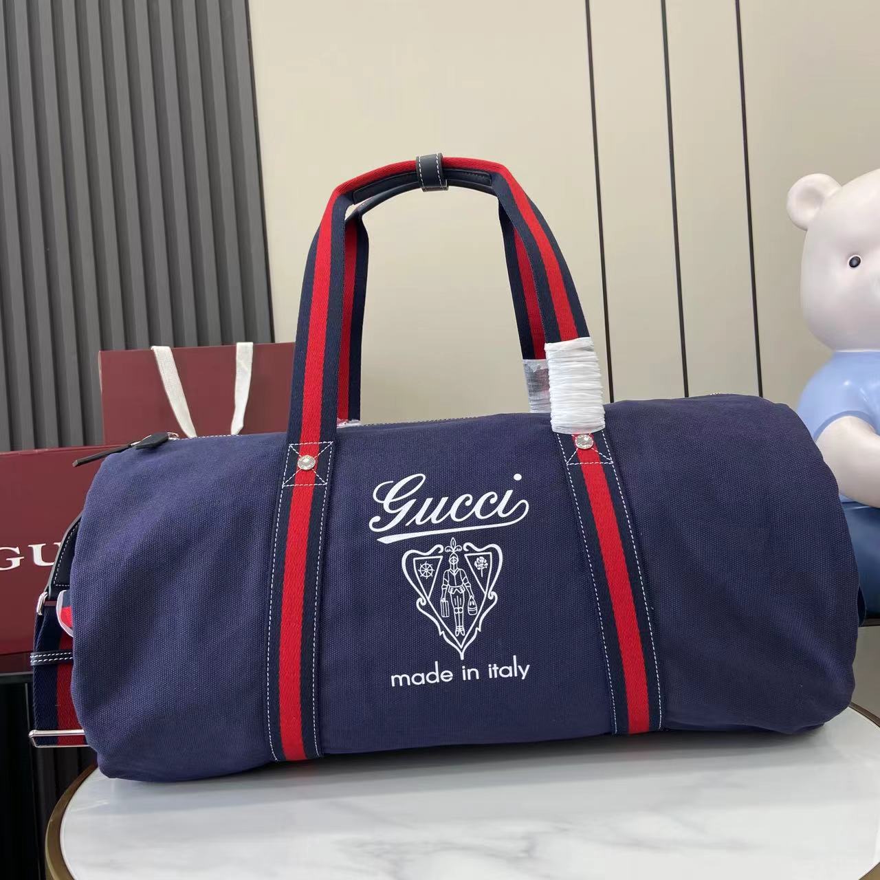 Gucci Large Printed Canvas Duffle Bag - DesignerGu