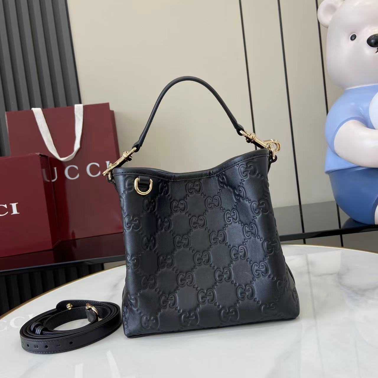 Gucci GG Emblem Small Bucket Bag  - DesignerGu