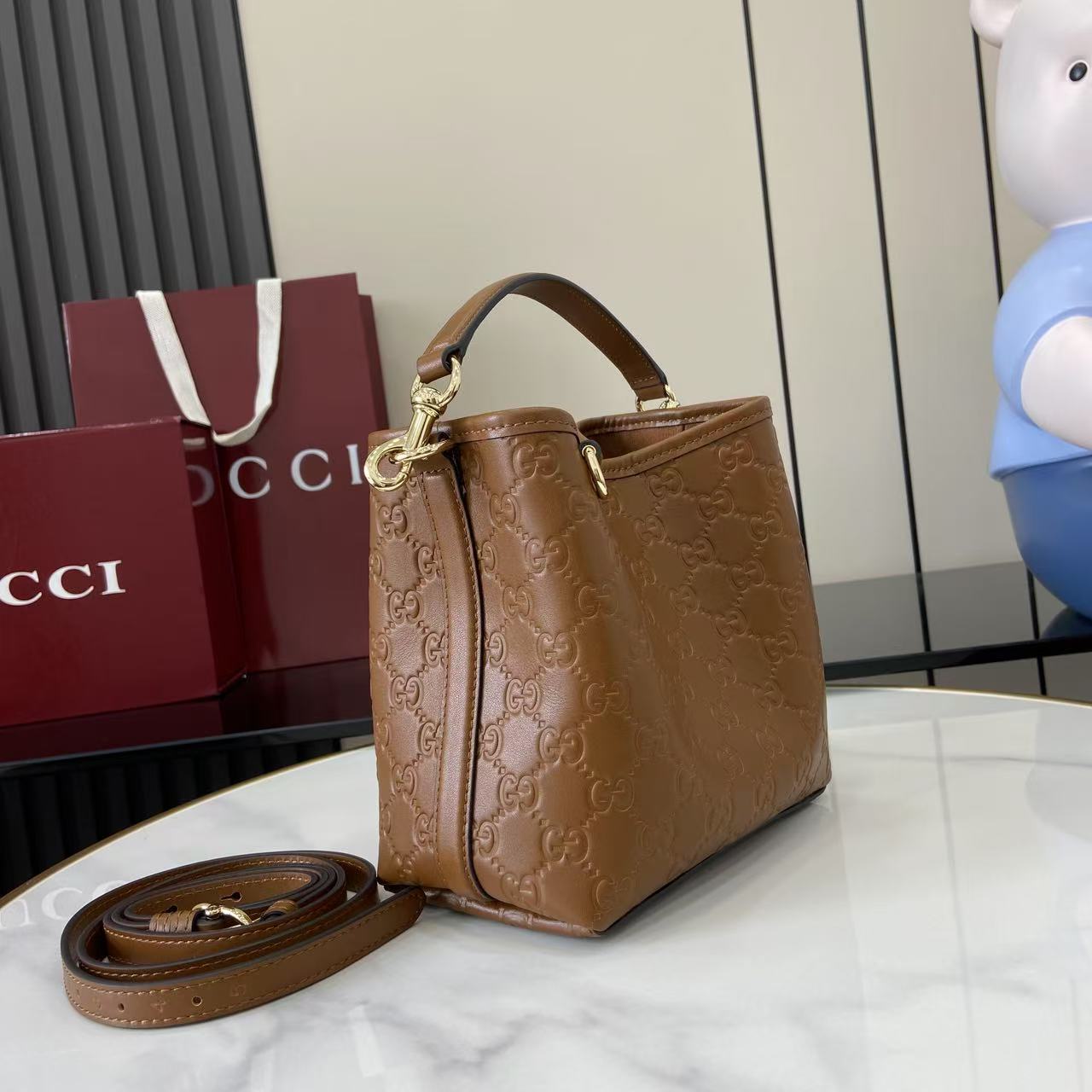 Gucci GG Emblem Small Bucket Bag  - DesignerGu
