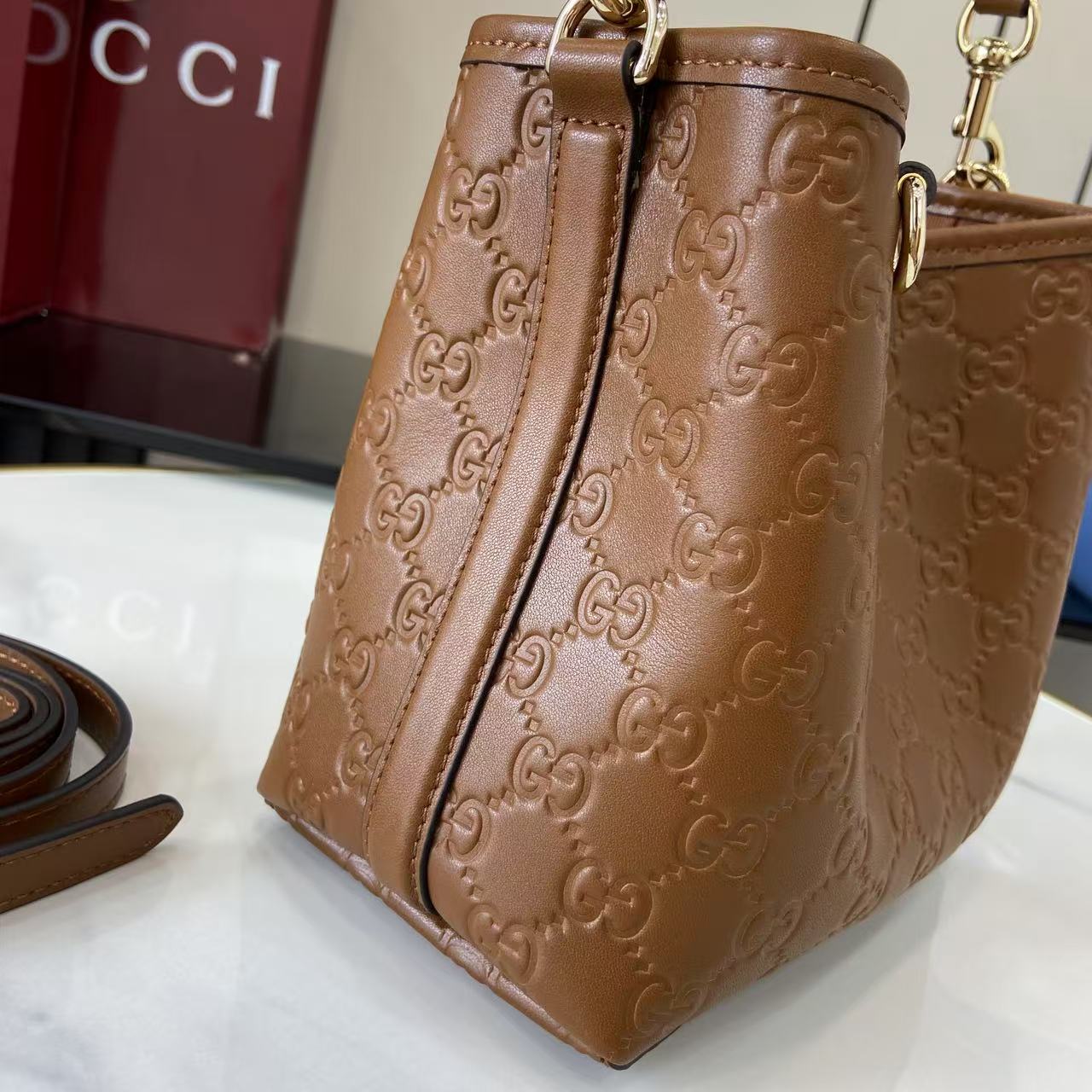 Gucci GG Emblem Small Bucket Bag  - DesignerGu