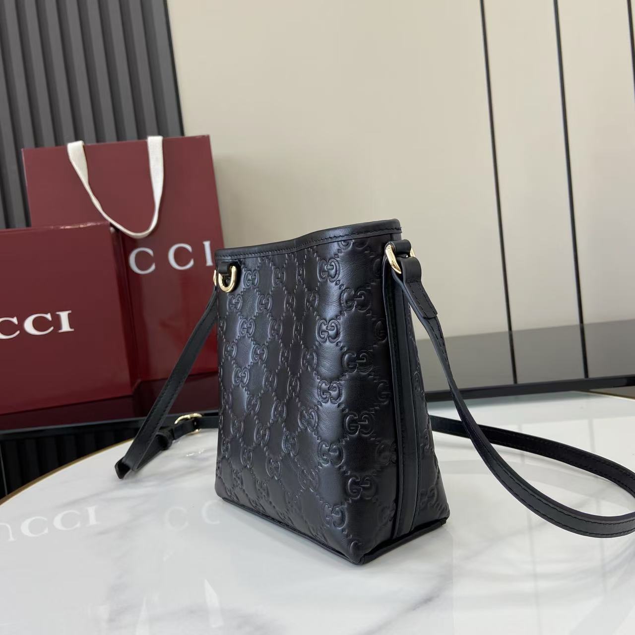 Gucci GG Emblem Nano Bucket Bag - DesignerGu