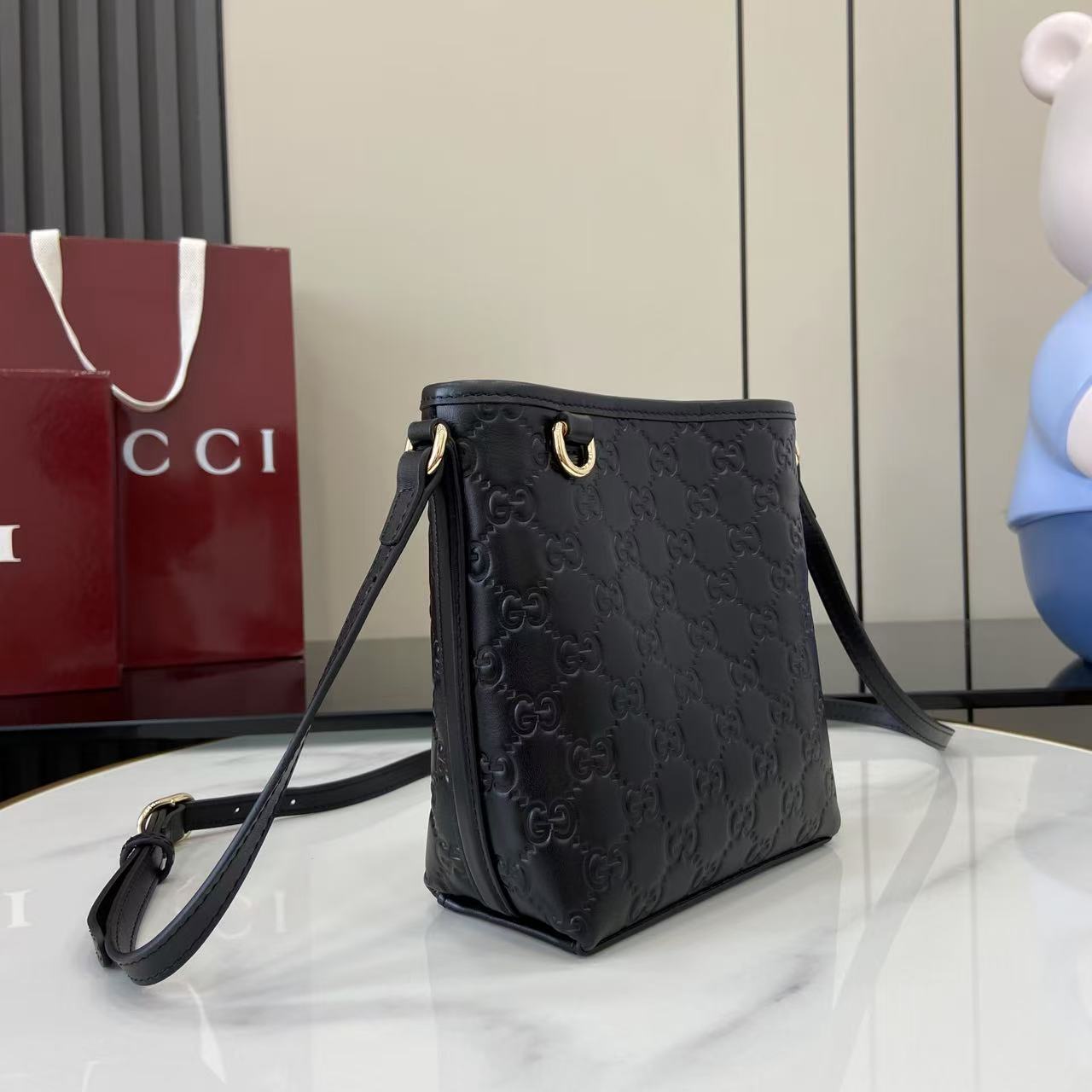 Gucci GG Emblem Nano Bucket Bag - DesignerGu