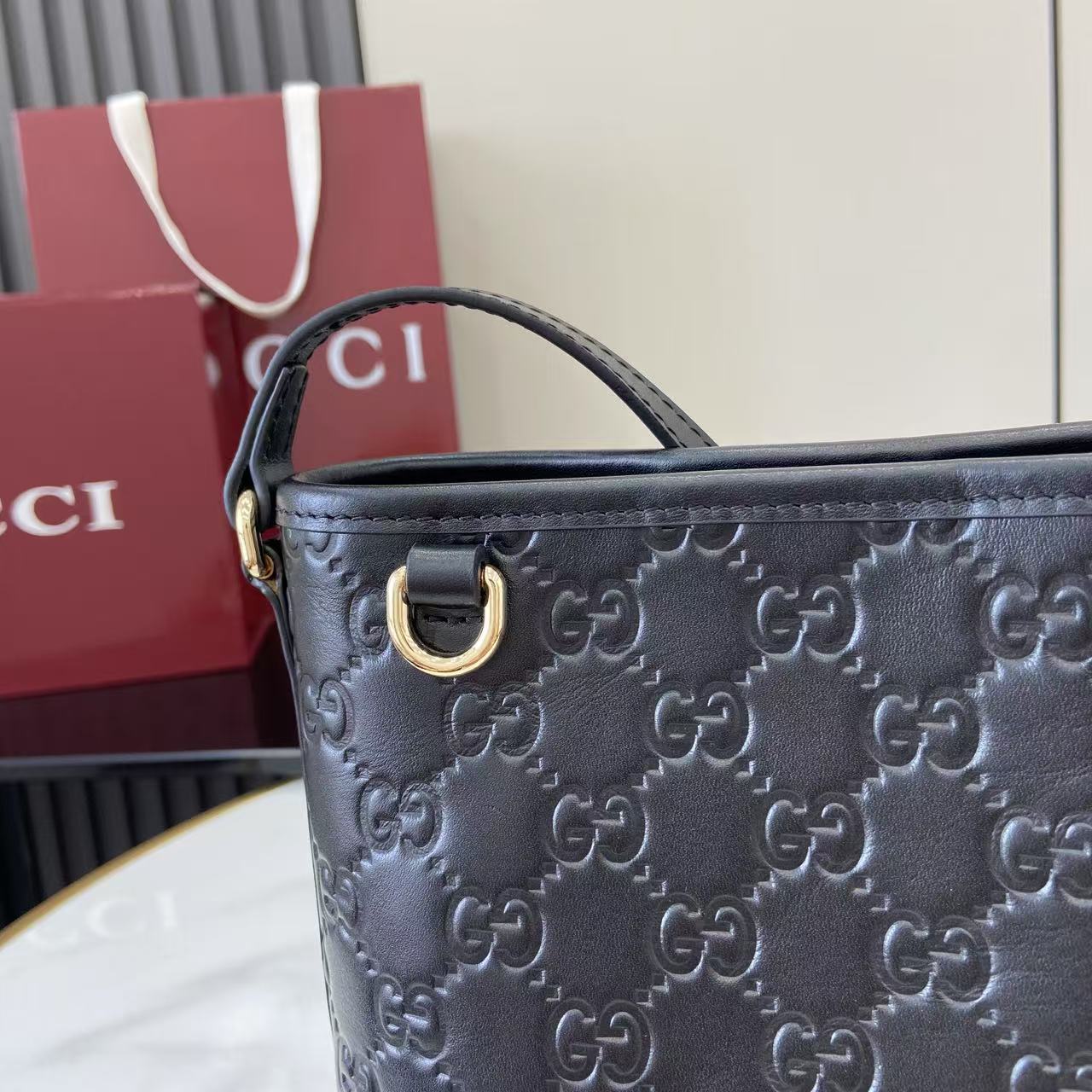 Gucci GG Emblem Nano Bucket Bag - DesignerGu