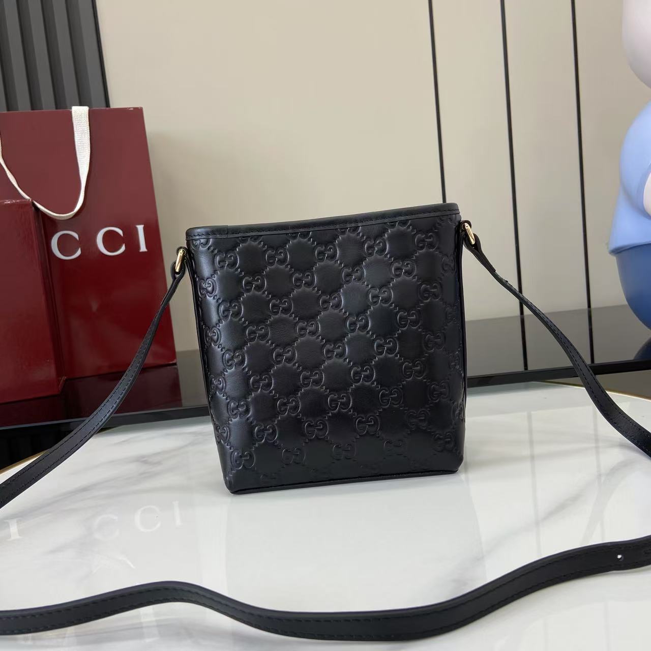 Gucci GG Emblem Nano Bucket Bag - DesignerGu