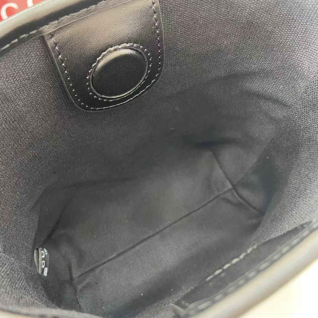 Gucci GG Emblem Nano Bucket Bag - DesignerGu