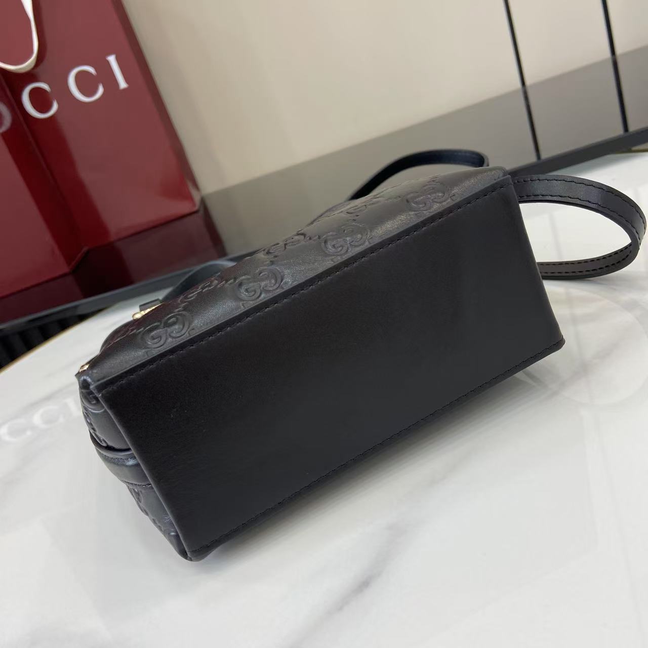 Gucci GG Emblem Nano Bucket Bag - DesignerGu