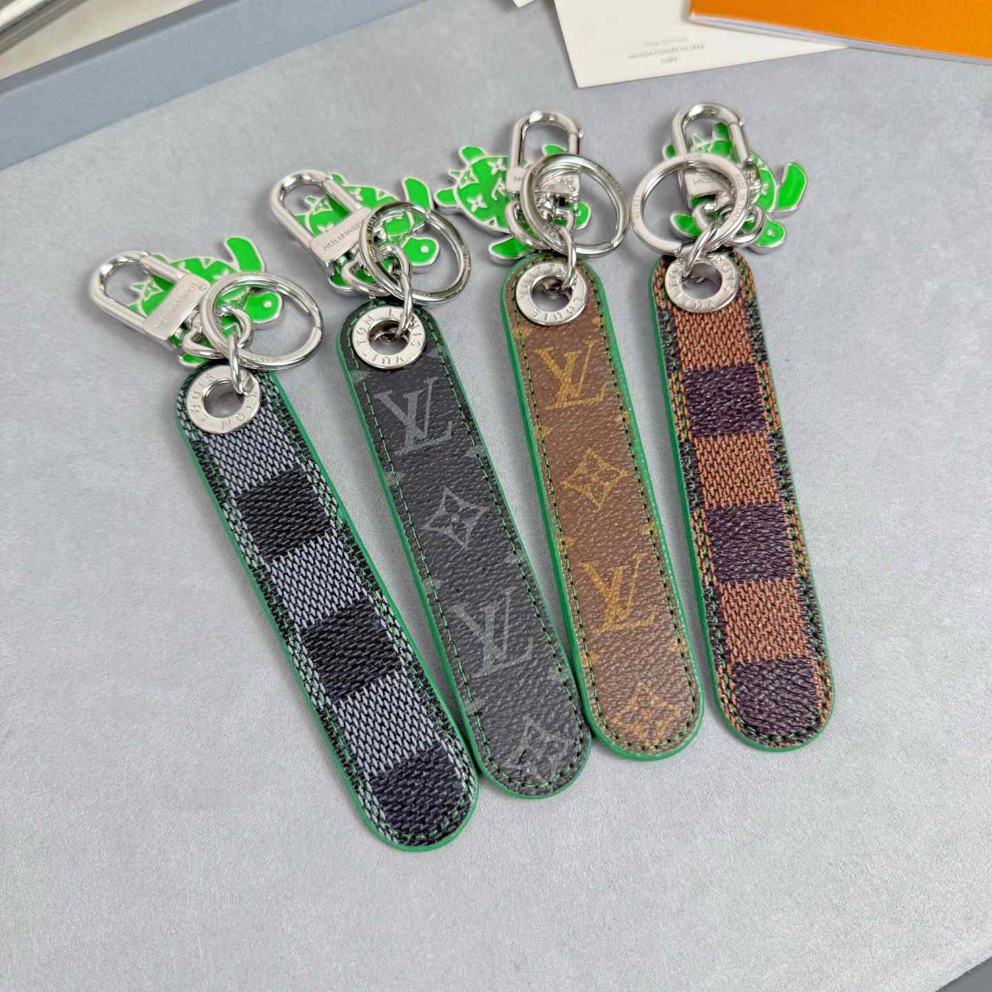 Louis Vuitton Dragonne Tab Key Holder and Bag Charm   M02564 - DesignerGu