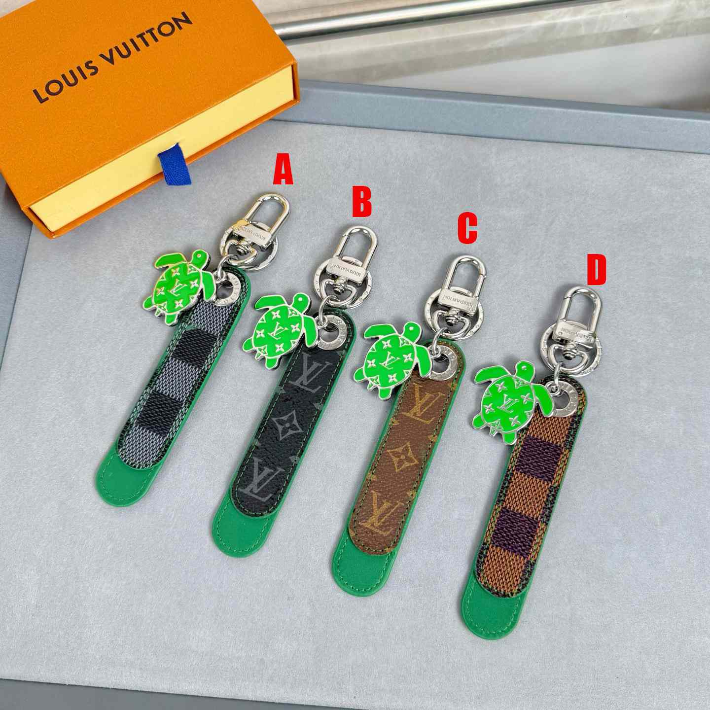 Louis Vuitton Dragonne Tab Key Holder and Bag Charm   M02564 - DesignerGu