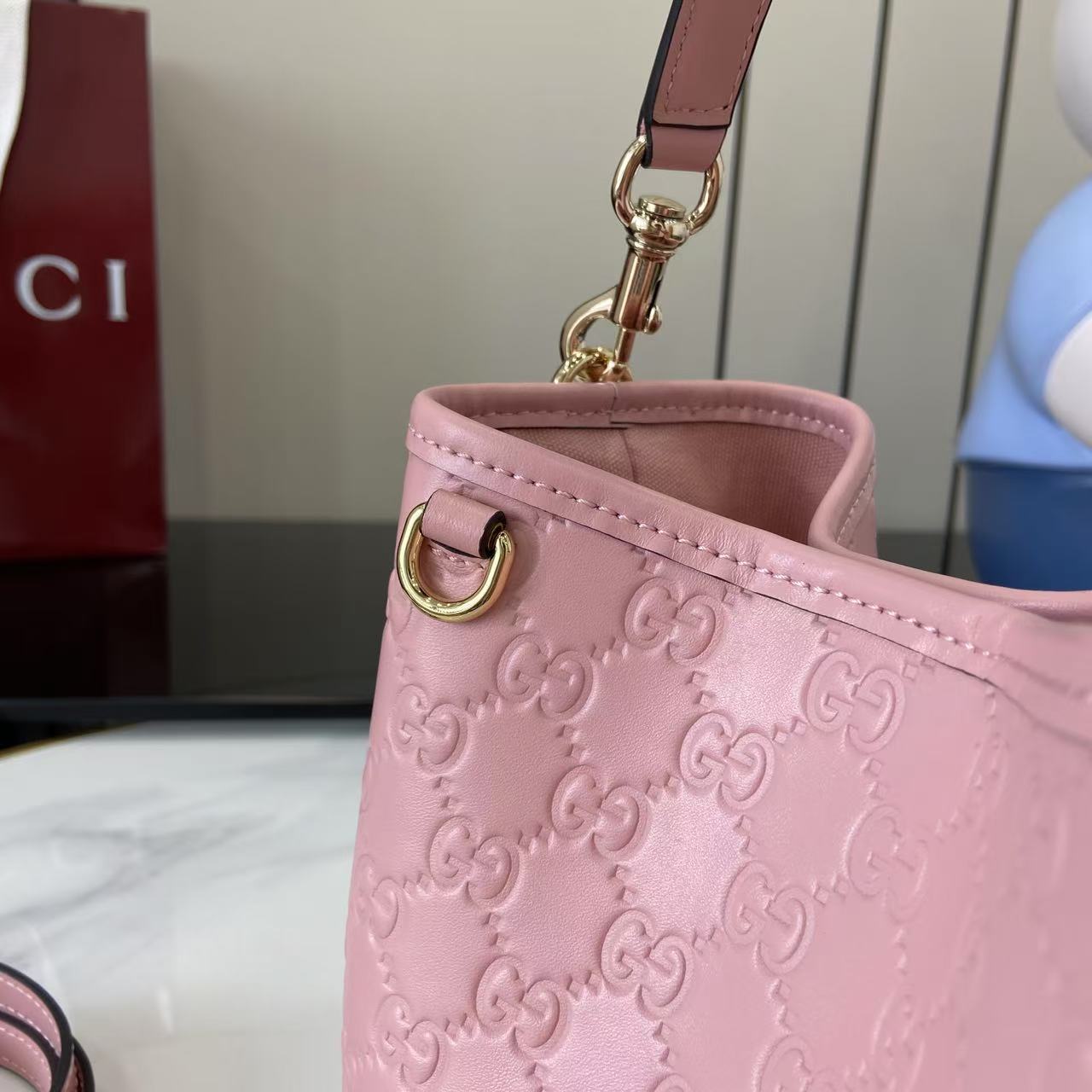 Gucci GG Emblem Nano Bucket Bag - DesignerGu