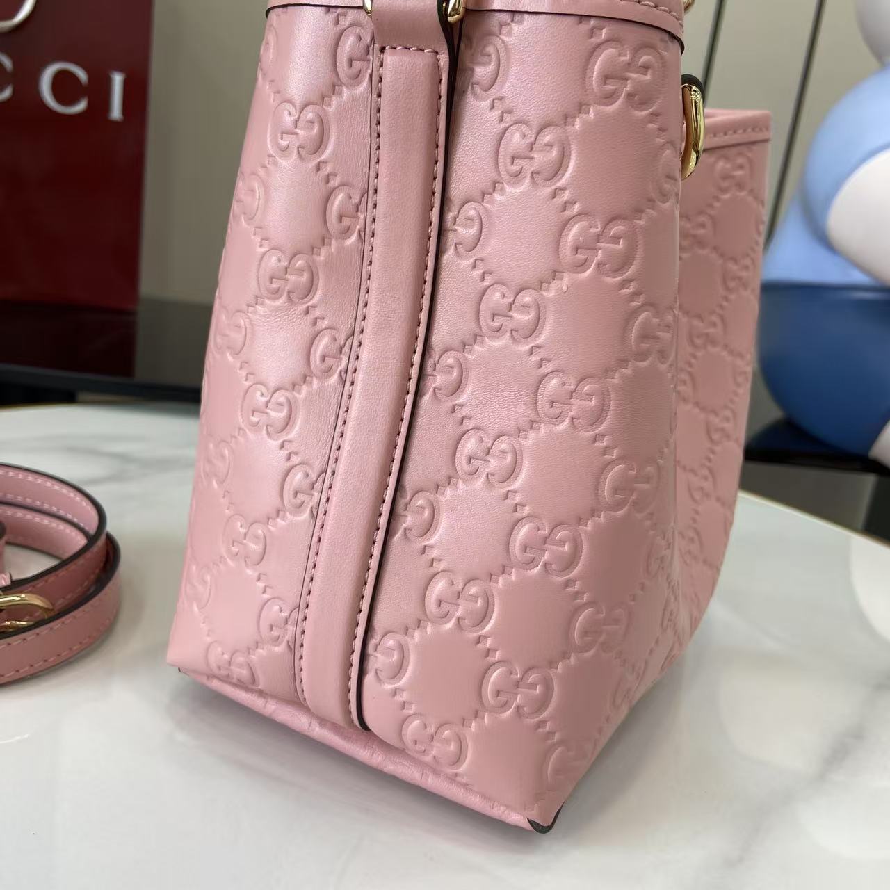 Gucci GG Emblem Nano Bucket Bag - DesignerGu