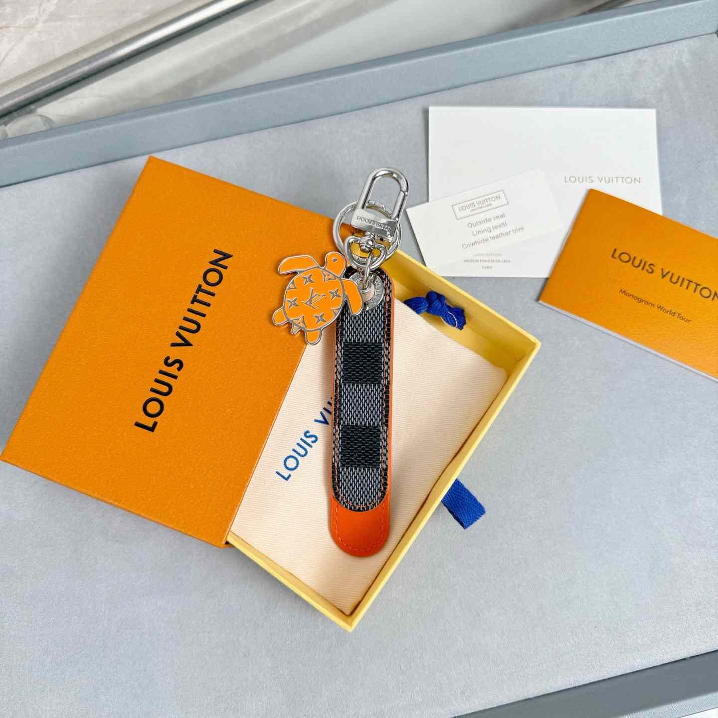 Louis Vuitton Dragonne Tab Key Holder and Bag Charm   M02558 - DesignerGu