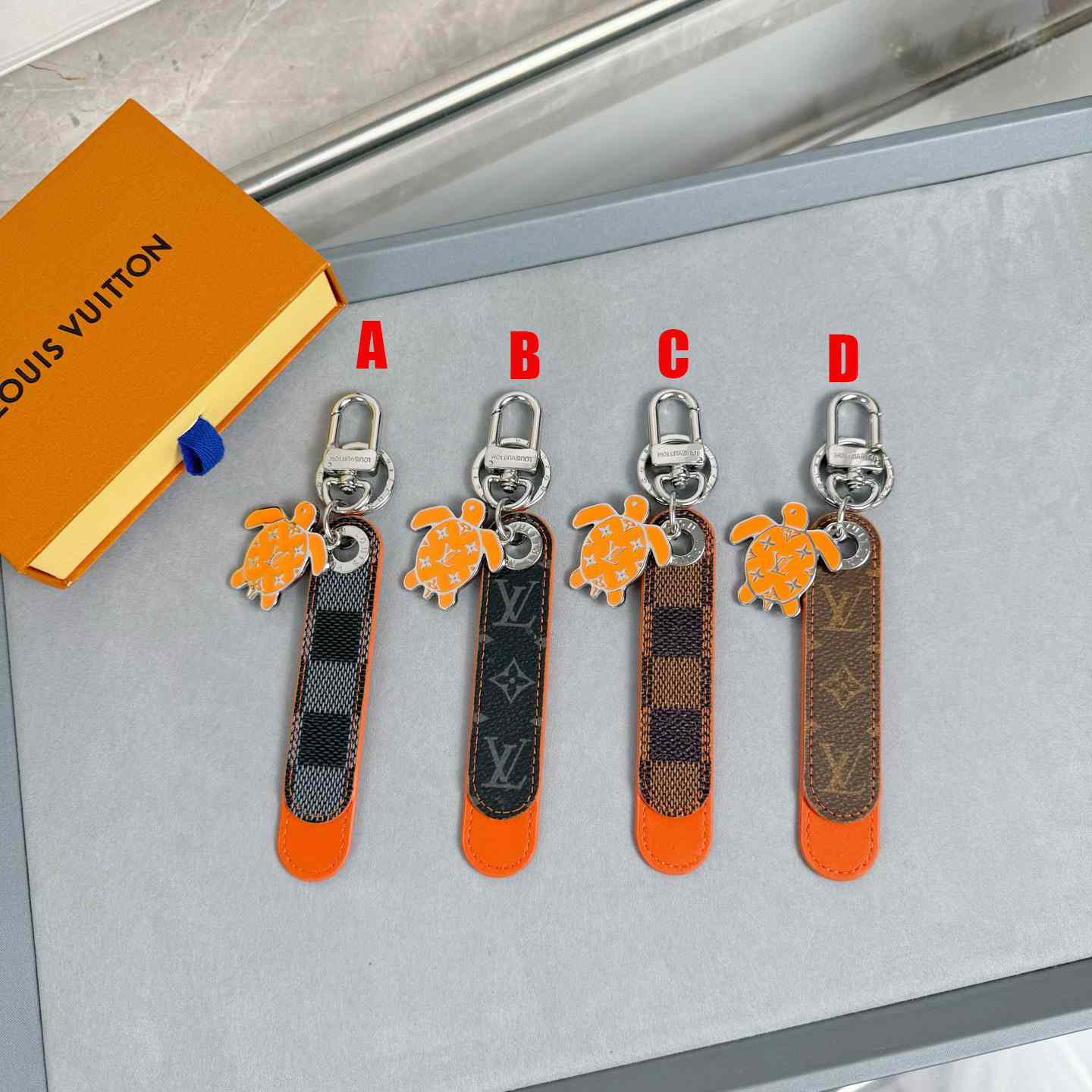 Louis Vuitton Dragonne Tab Key Holder and Bag Charm   M02558 - DesignerGu