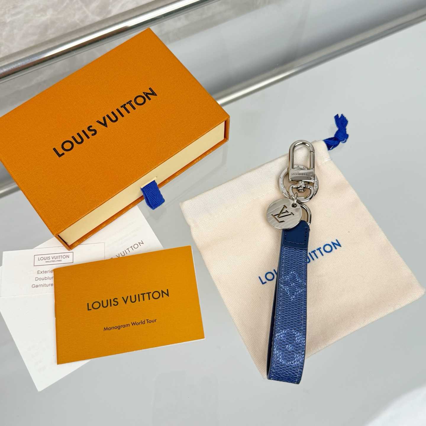 Louis Vuitton LV Slim Dragonne Key Holder and Bag Charm S00  - DesignerGu