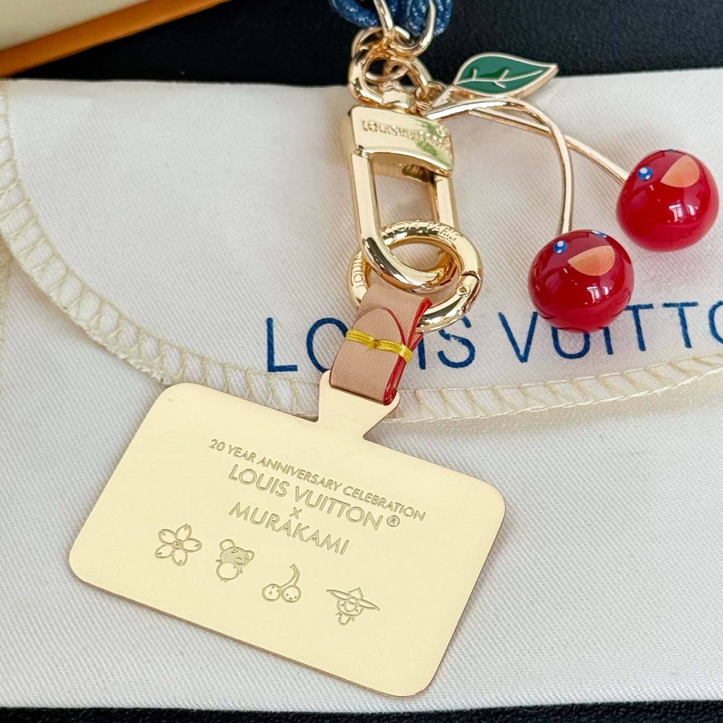 Louis Vuitton LV x TM Denim Cerise Phone Holder S00   M02623 - DesignerGu