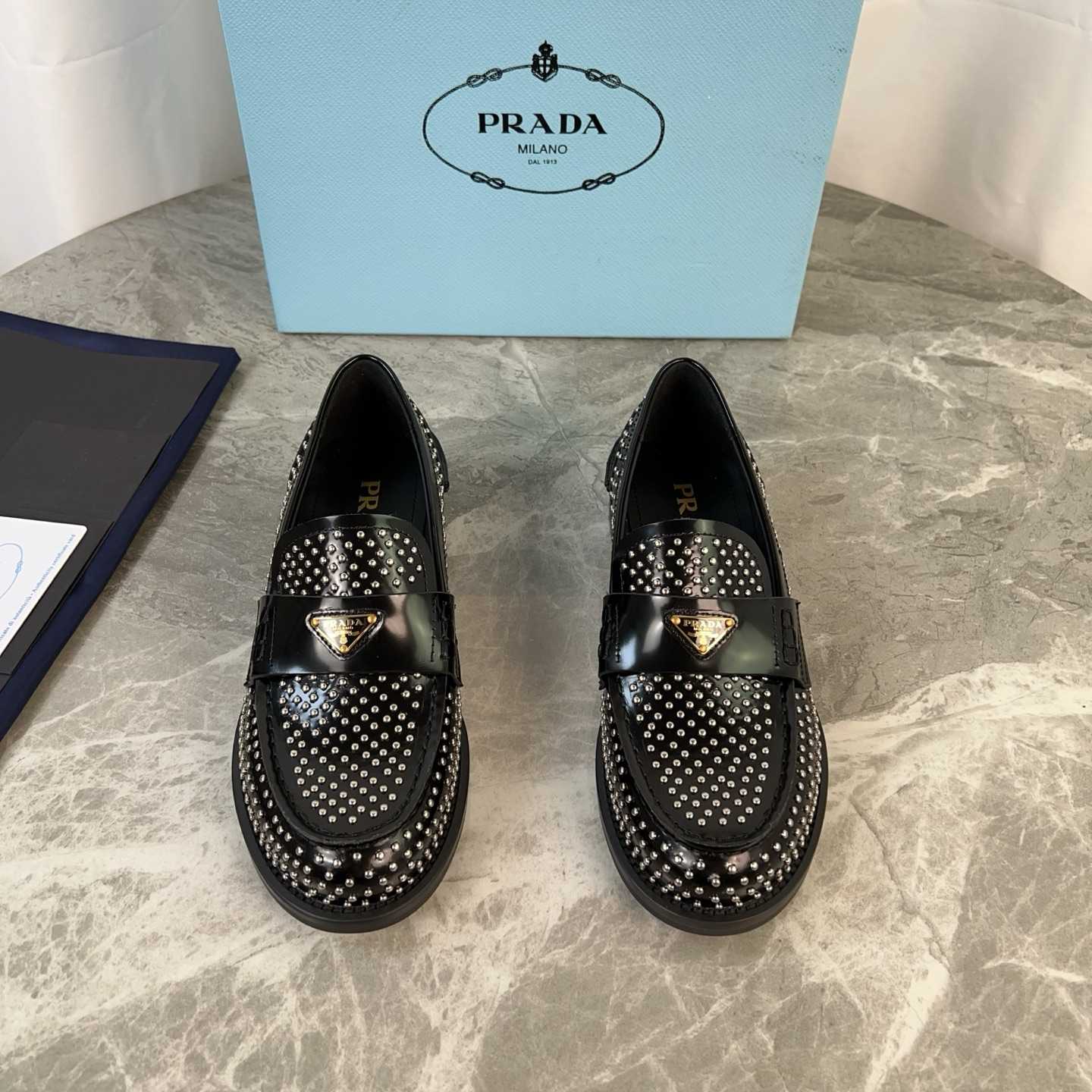Prada Studded Brushed Leather Loafers - DesignerGu