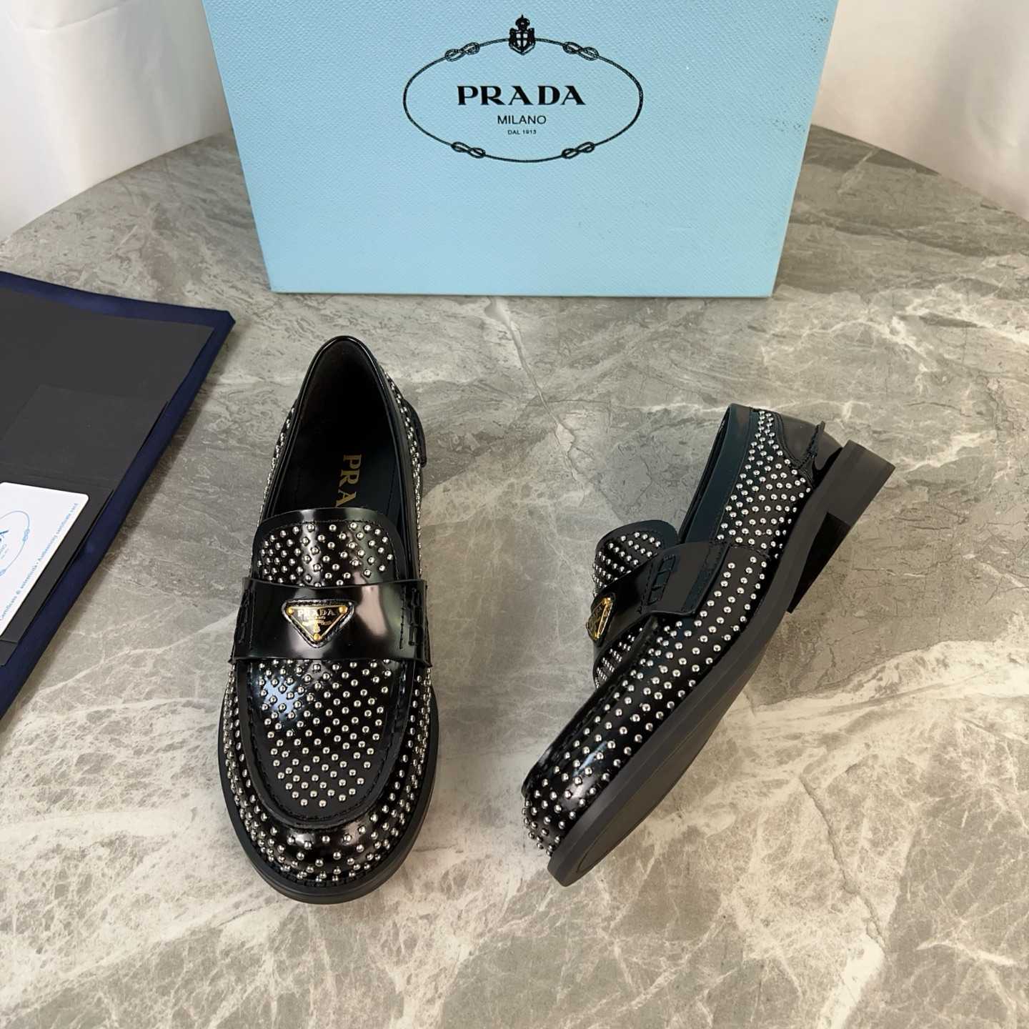 Prada Studded Brushed Leather Loafers - DesignerGu