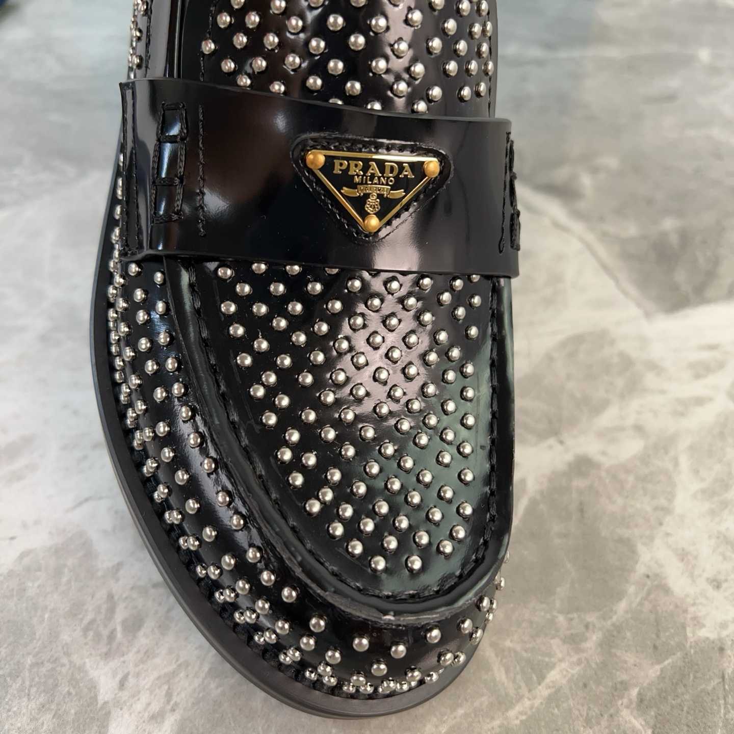 Prada Studded Brushed Leather Loafers - DesignerGu