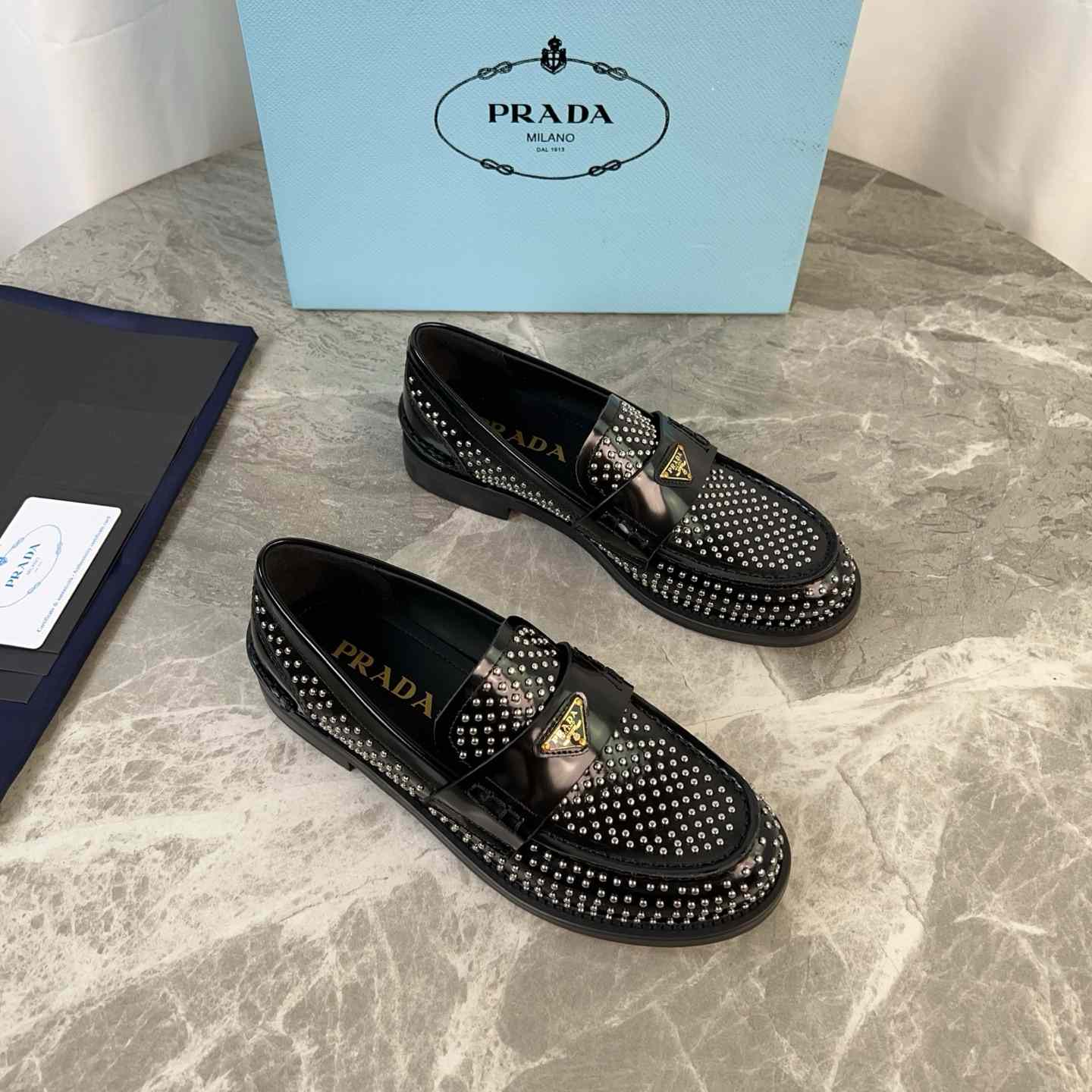 Prada Studded Brushed Leather Loafers - DesignerGu