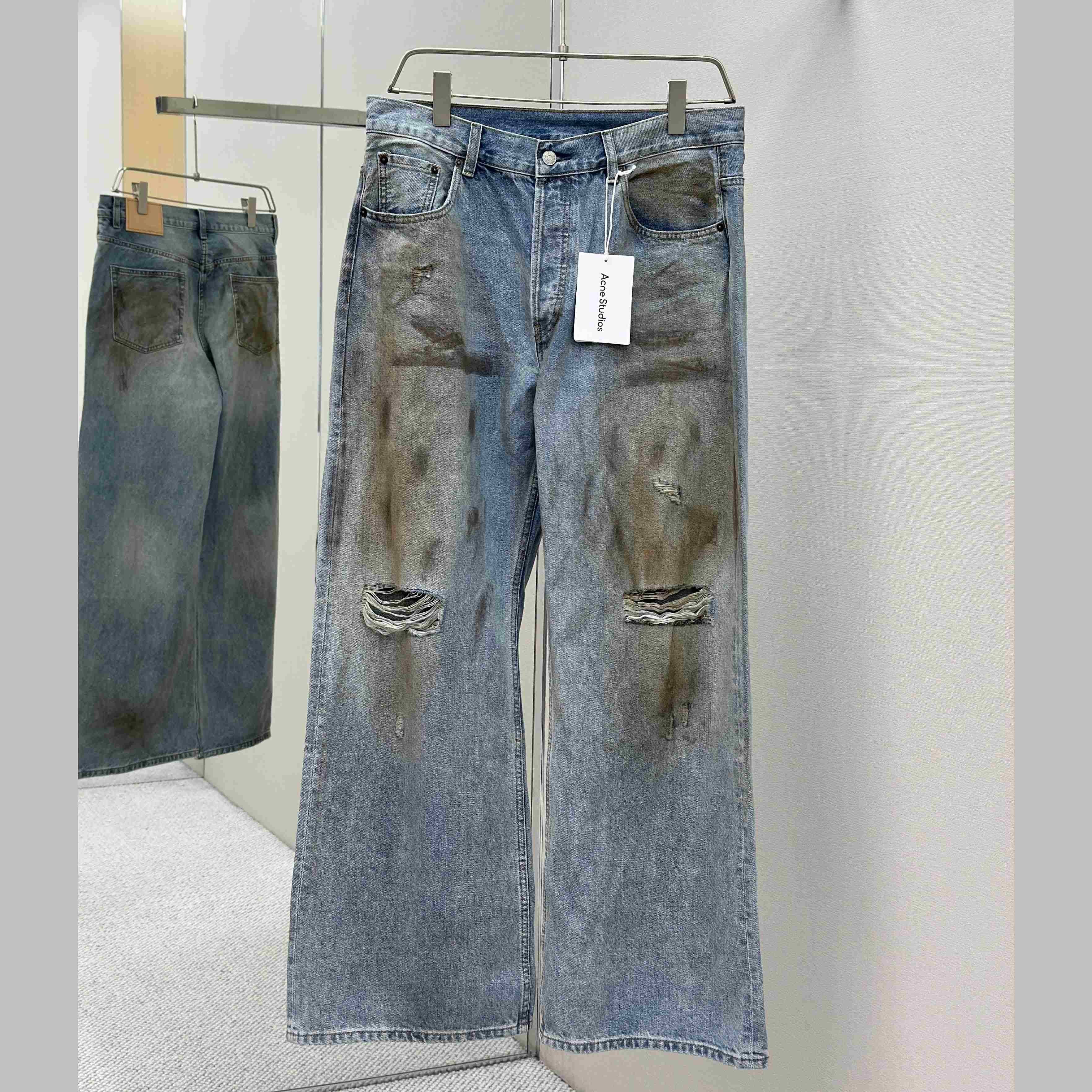 Acne Studios Mud-dyed torn jeans - DesignerGu