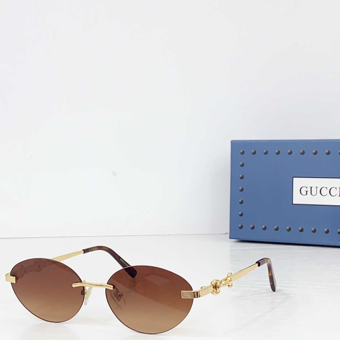 Gucci Frameless Oval Sunglasses - DesignerGu