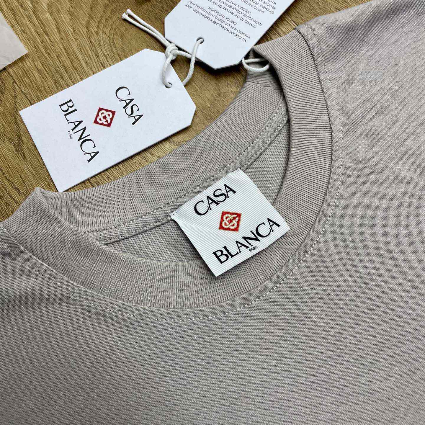 Casablanca FLAMING TENNIS BALL OVERSIZED SHORT SLEEVE T‑SHIRT C1115 - DesignerGu