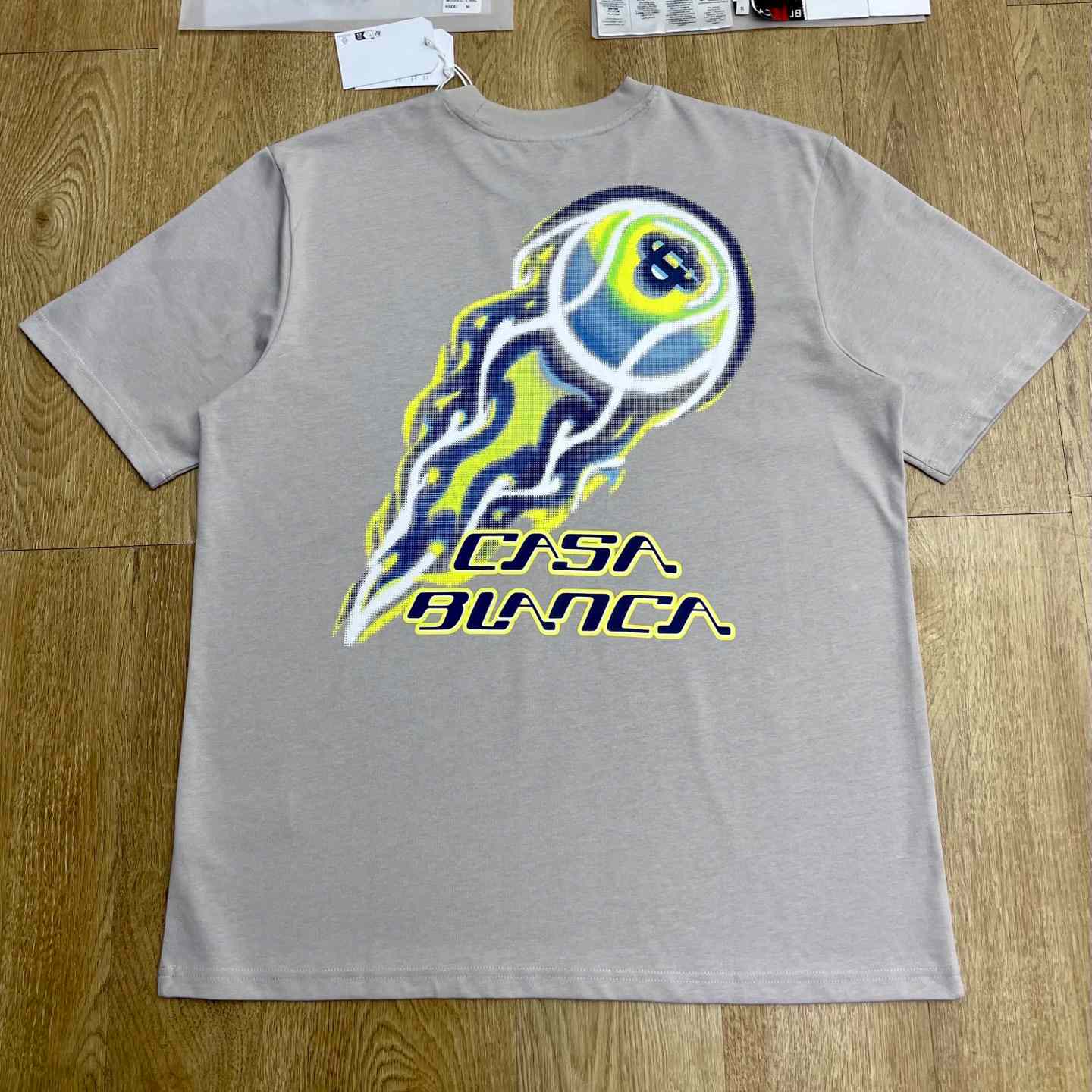 Casablanca FLAMING TENNIS BALL OVERSIZED SHORT SLEEVE T‑SHIRT C1115 - DesignerGu