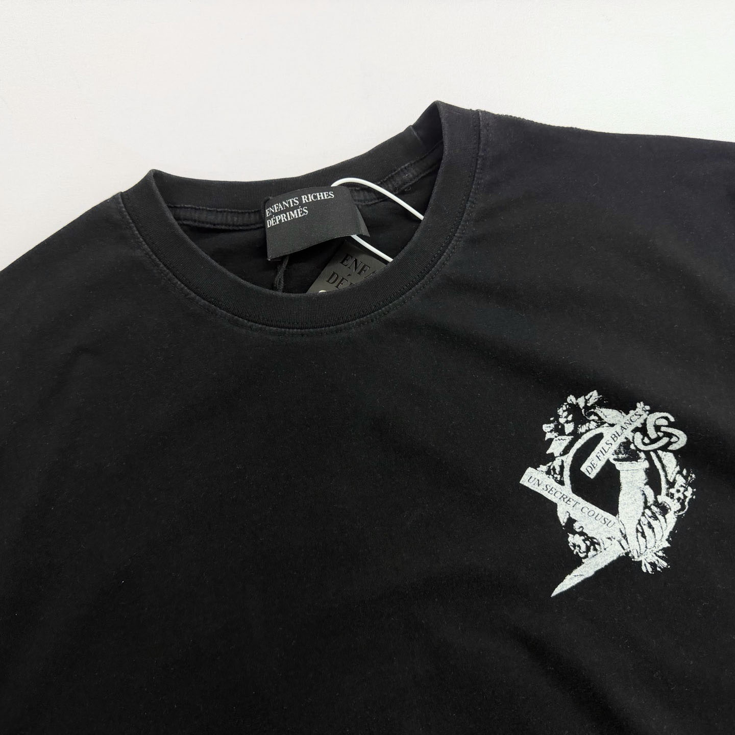 Enfants Riches Déprimés Un Secret Printed Cotton T-shirt - DesignerGu