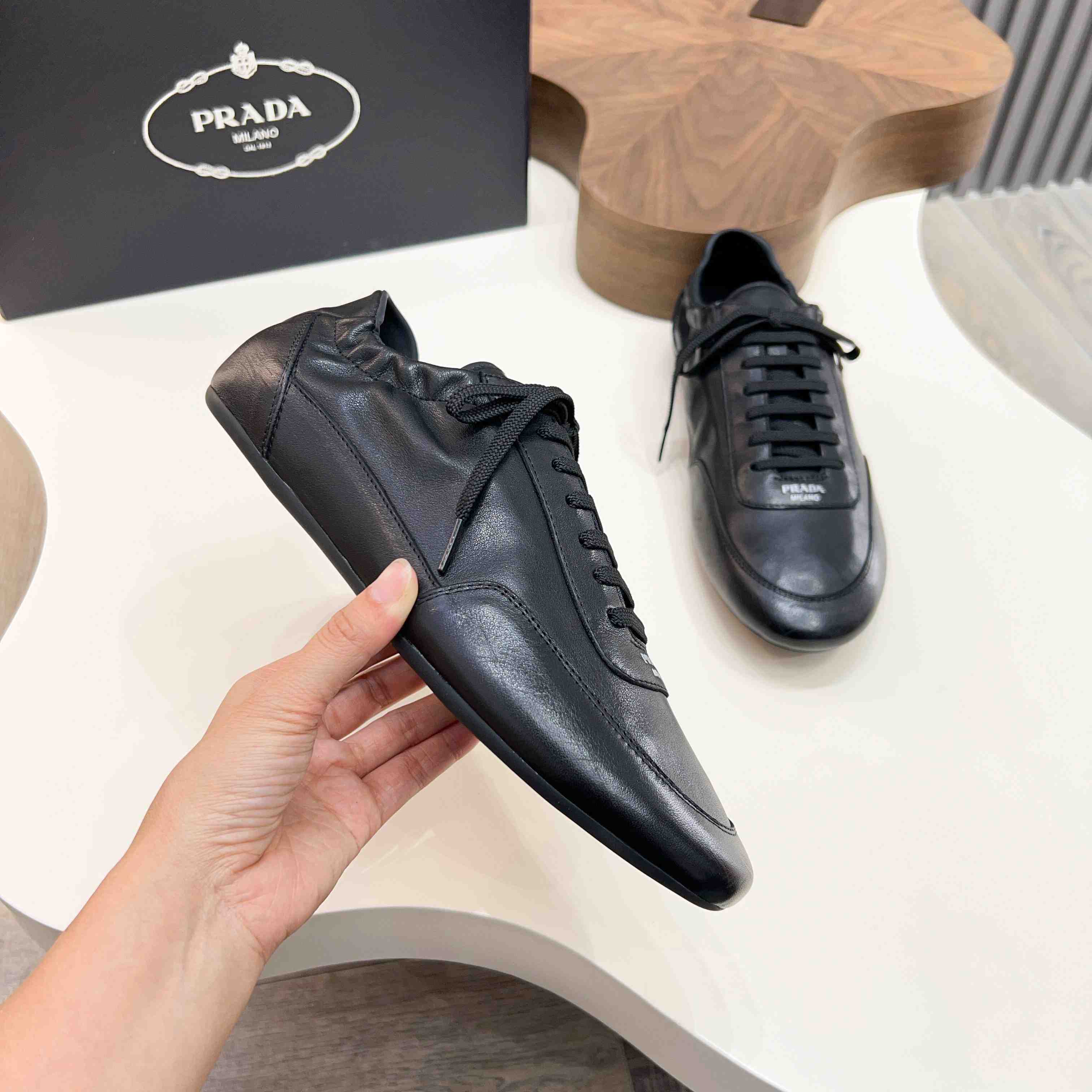 Prada Collapse Leather Sneakers - DesignerGu